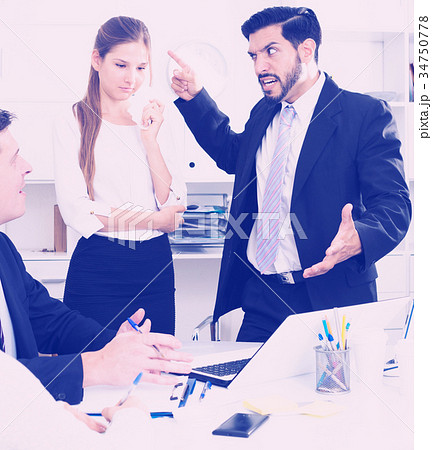 Irritated boss scolding subordinates 34750778