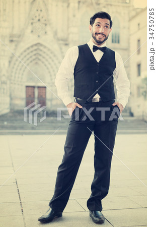 Portrait of man against old castle 34750785