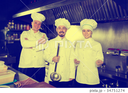 Professional chefs showing their workplace 34751274