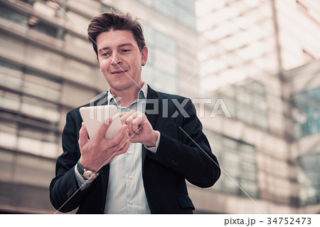 Male testing digital tablet and touchscreen 34752473