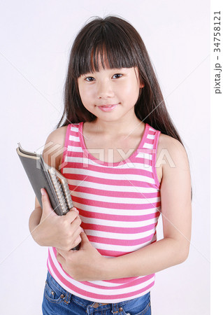Portrait of little asian girl holding the book Portrait of little asian girl holding the book 34758121