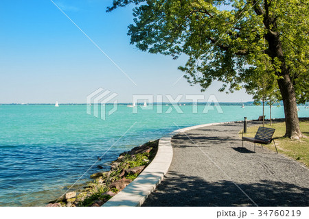 A view of Balaton lake with white yachts  A view of Balaton lake with white yachts  34760219