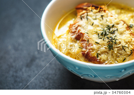 French onion soup in blue ceramic bowl French onion soup in blue ceramic bowl 34760304