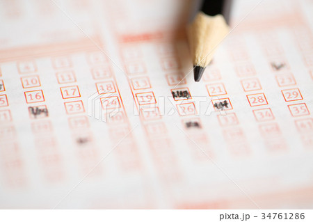 Photo above of lottery ticket with pencil Photo above of lottery ticket with pencil 34761286