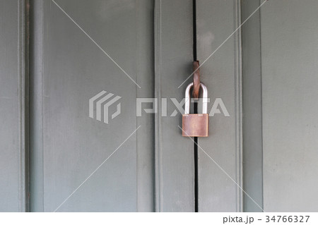 Wooden door lock by Steel padlock. 34766327