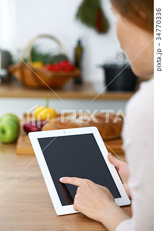 Close-up of human hands are gesticulate over a Close-up of human hands are gesticulate over a 34770336