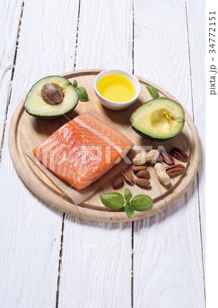 Healthy food vegetables , nuts and salmon Healthy food vegetables , nuts and salmon 34772151