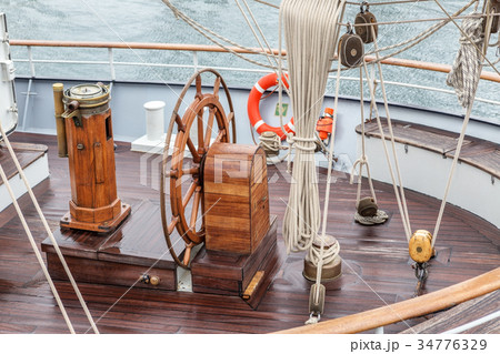 Steering wheel for captain on an old sailboat 34776329