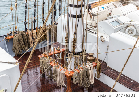 Ropes on the mast for sailing. Ropes on the mast for sailing. 34776331