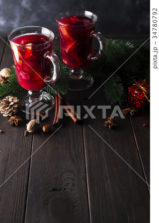 Cup of hot wine with spices 34780792
