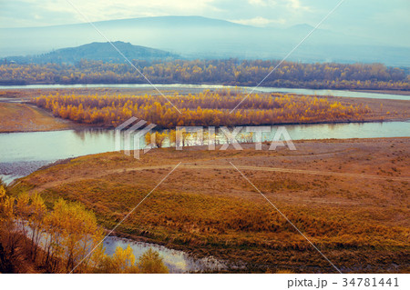 A winding river in the valley A winding river in the valley 34781441