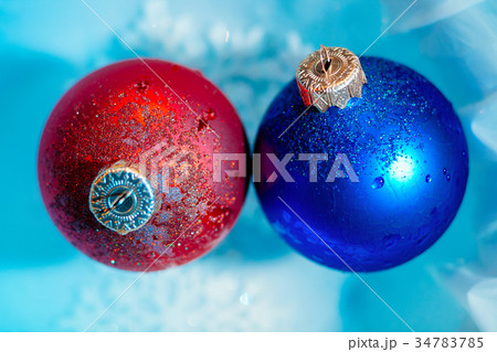 frozen ice balls decoration on winter background frozen ice balls decoration on winter background 34783785