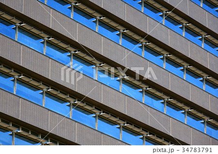 Business building windows with sky reflection Business building windows with sky reflection 34783791