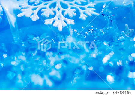 snowflake melts in water bokeh abstract background snowflake melts in water bokeh abstract background 34784166