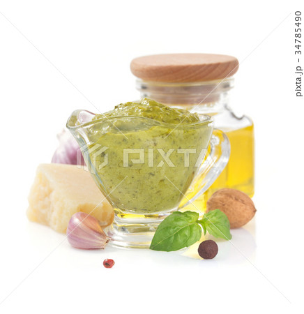 pesto sauce in gravy boat on white pesto sauce in gravy boat on white 34785490