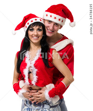 Happy christmas couple, isolated over white Happy christmas couple, isolated over white 34788195