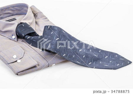 shirt and dark blue tie on white 34788875