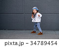 model child hip-hop.baby in a baseball cap. 34789454