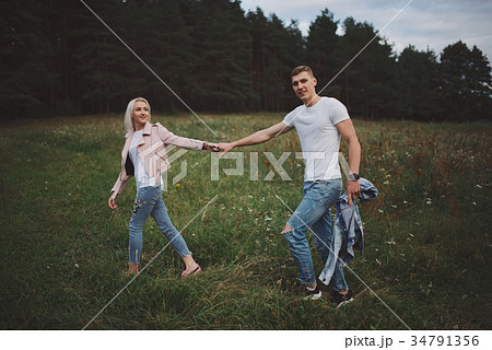 beautiful blonde girl with boyfriend 34791356