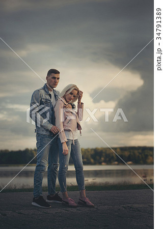 beautiful blonde girl with boyfriend 34791389