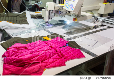 Sewing machine in cutting shop on clothing factory 34796096