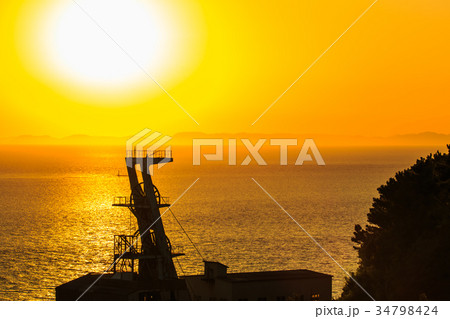 池島展望台からの夕陽 池島炭鉱跡 第二竪坑櫓 長崎 34798424