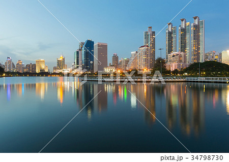 Twilight office building in public park 34798730