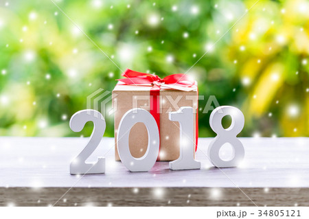 Wooden numbers forming the number 2018 34805121