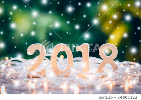 Wooden numbers forming the number 2018 34805122