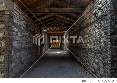 Creepy attic interior at abandoned building 34807312