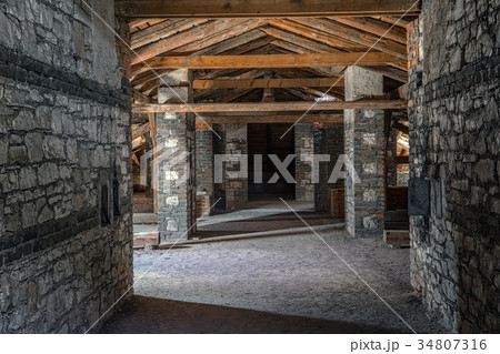 Creepy attic interior at abandoned building 34807316