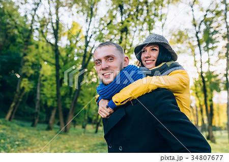 Happy Couple Having Fun in Autumn Park. Yellow 34807677
