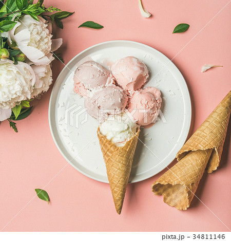 Strawberry and coconut ice cream, cones, white Strawberry and coconut ice cream, cones, white 34811146