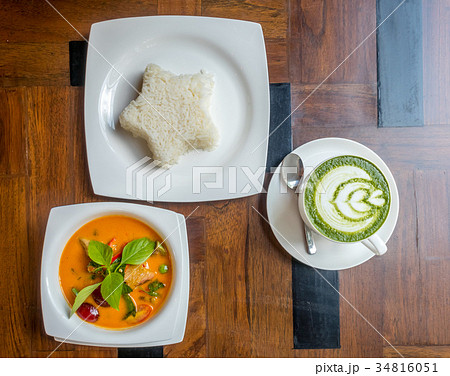 Thai curry soup with rice and hot green tea Thai curry soup with rice and hot green tea 34816051