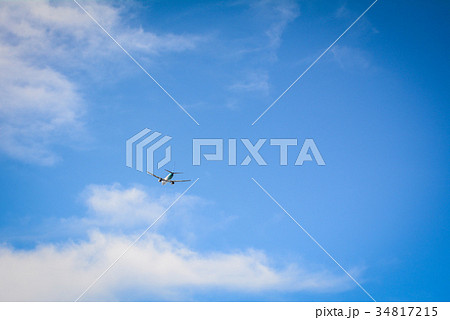 Airplane flying in the blue sky Airplane flying in the blue sky 34817215