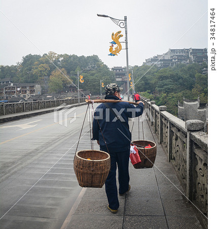 Vendor on street in Phoenix Town in China Vendor on street in Phoenix Town in China 34817464