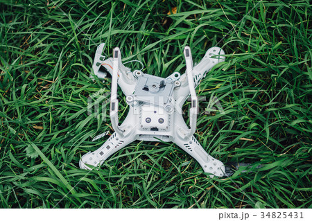 Crashed drone on the ground Crashed drone on the ground 34825431