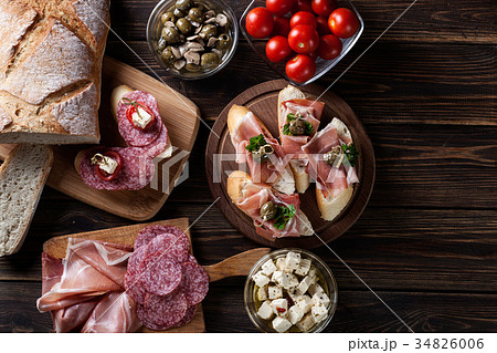 Spanish tapas with slices jamon serrano Spanish tapas with slices jamon serrano 34826006