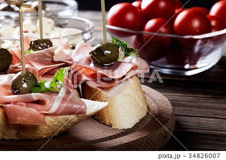 Spanish tapas with slices jamon serrano 34826007