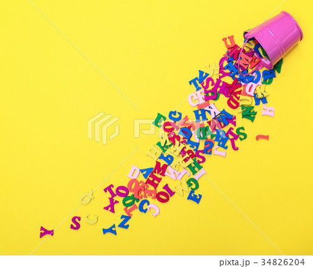 scattered wooden multicolored letters scattered wooden multicolored letters 34826204