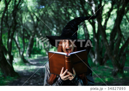 Image of young screaming witch 34827893