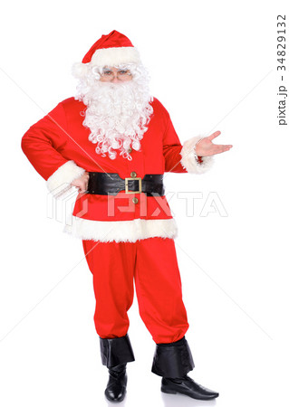 Santa Claus gesticulate while standing straight Santa Claus gesticulate while standing straight 34829132