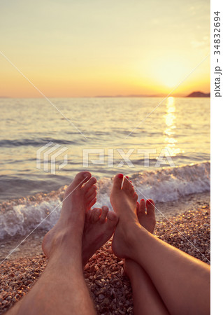 Couple lying on the beach 34832694