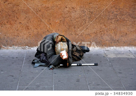 The old beggar woman 34834930