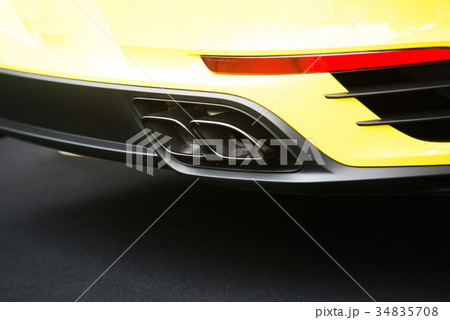 Close up on sport car exhaust pipe 34835708