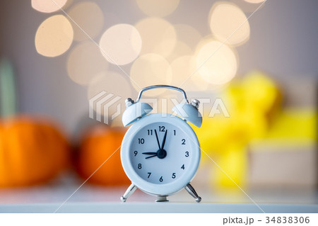Retro alarm clock with pumpkins and gift box Retro alarm clock with pumpkins and gift box 34838306