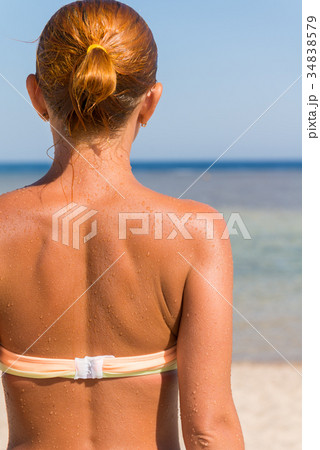Beach babe from behind 34838579