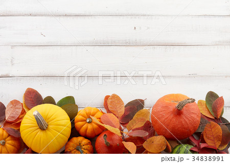 Fall background of colorful autumn pumpkins and leaves 34838991