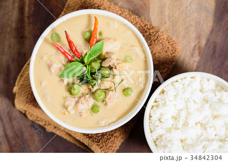 Thai food,red curry with pork and cooked rice Thai food,red curry with pork and cooked rice 34842304