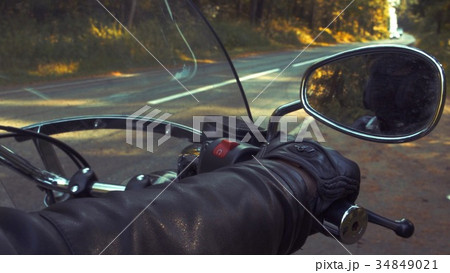 Motorcyclist on the road tripping 34849021